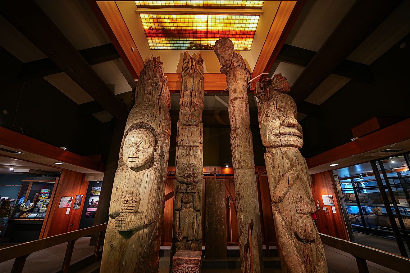 Editorial Photo Credit: Alexandre.ROSA via Shutterstock. Ketchikan, Alaska - August 26, 2023 : Old preserved Tlingit and Haida totem poles exhibited in the Totem Heritage Center in Ketchikan, Alaska, USA
