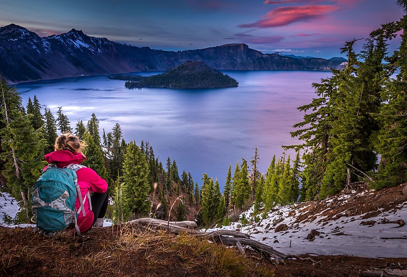Backpacker overlooking Crater Lake and Wizard Island.