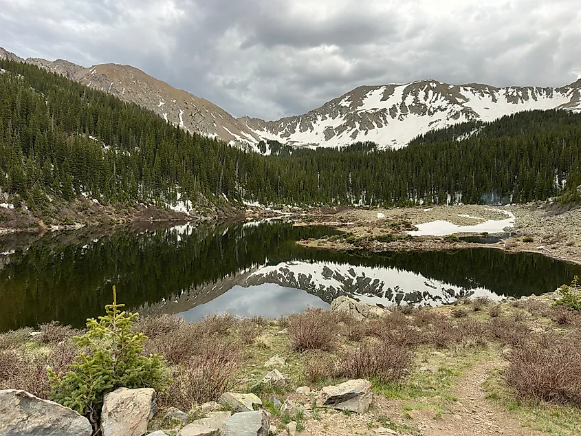 Scenic overlook of Williams Lake with Wheeler Peak in the background near Taos, NM.